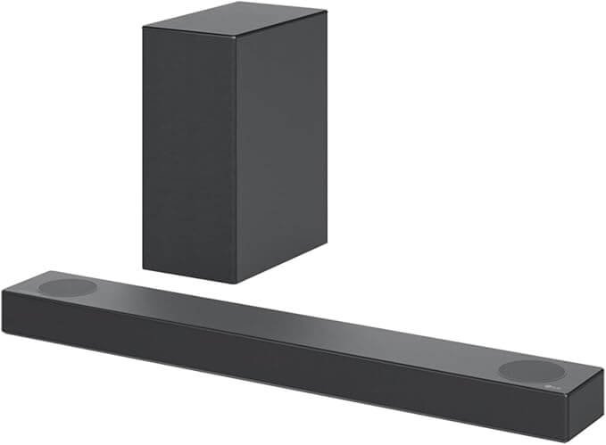Barre de son LG DS75 et son caisson de basses sans fil en coloris acier foncé sur meuble TV